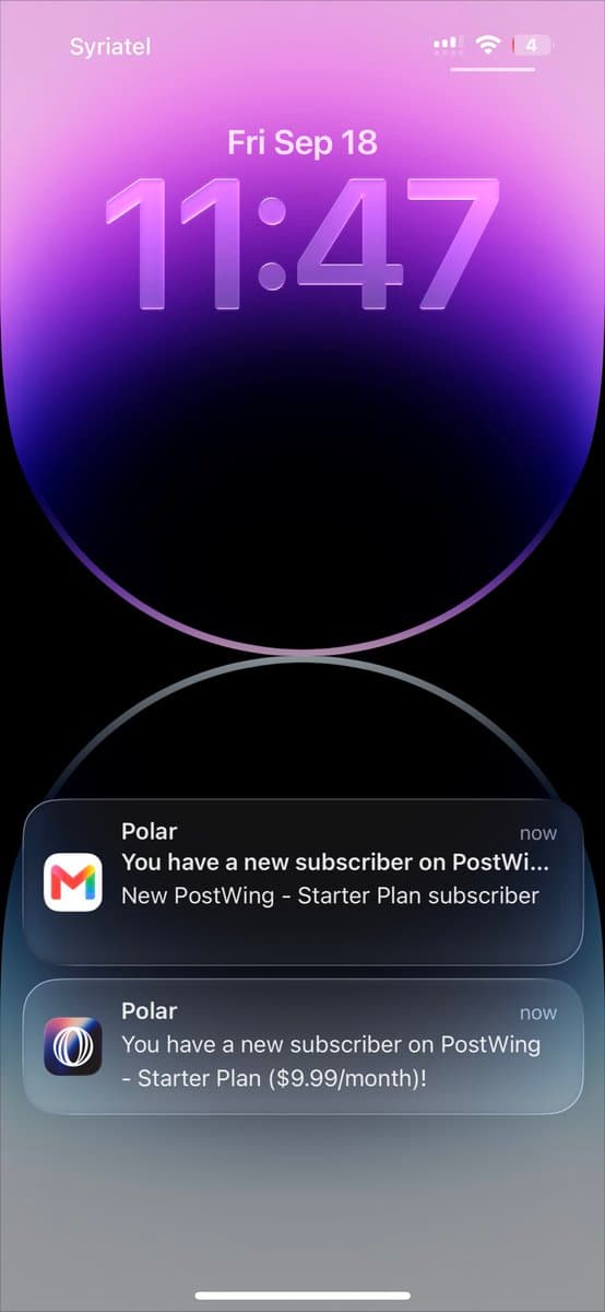 Phone lock screen with two notifications of a new PostWing Starter Plan subscriber